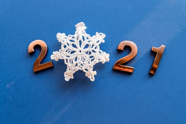 Bronze numbers with snowflake for new year