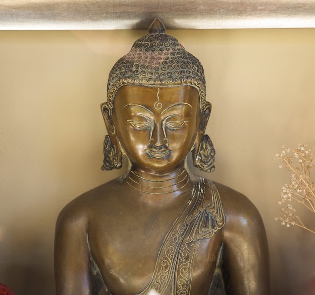 Bronze statue of seated Buddha