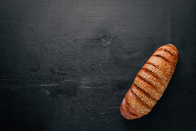 Brood op een houten achtergrond Bovenaanzicht Vrije ruimte voor tekst