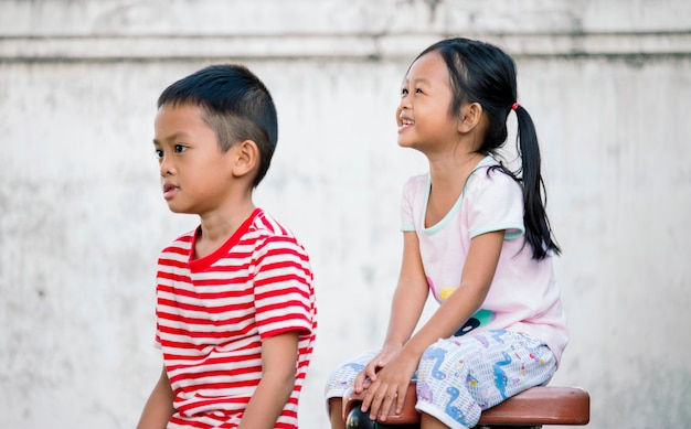 Brother and sister played together in the park, Happy concept together.