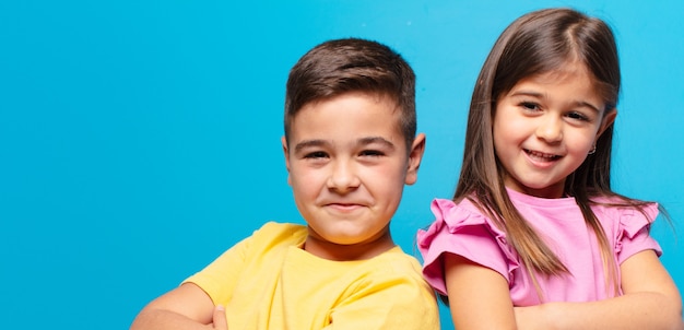 Brother and sister playing with happy expression