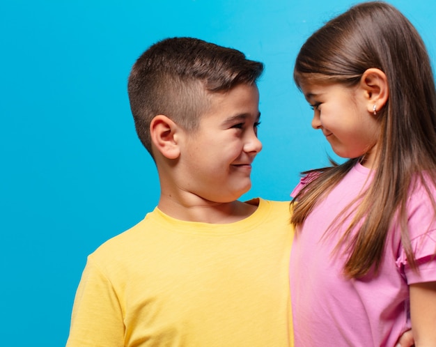 Brother and sister playing with happy expression