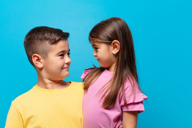 Brother and sister playing with happy expression