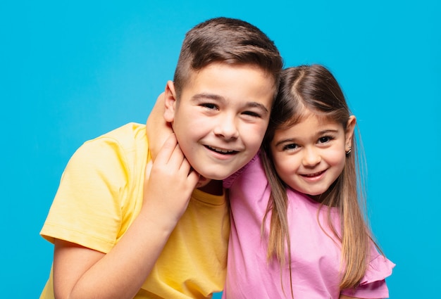 Brother and sister playing with happy expression