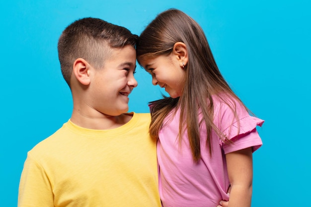 Brother and sister playing with happy expression