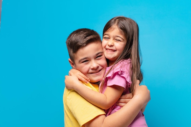 Brother and sister playing with happy expression