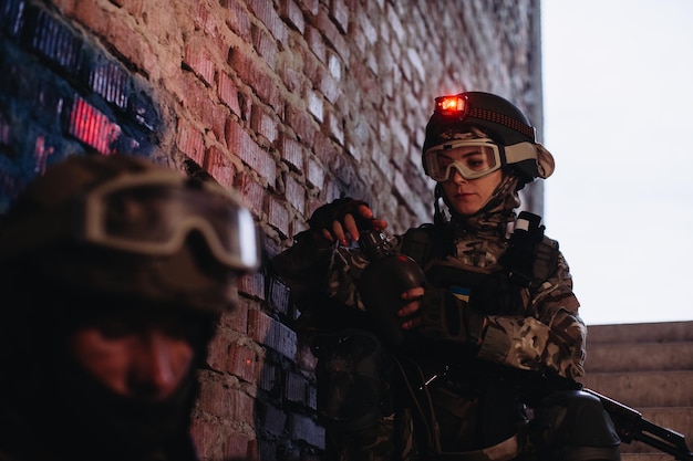 Brothers in arms resting against the background of the Ukrainian flag.