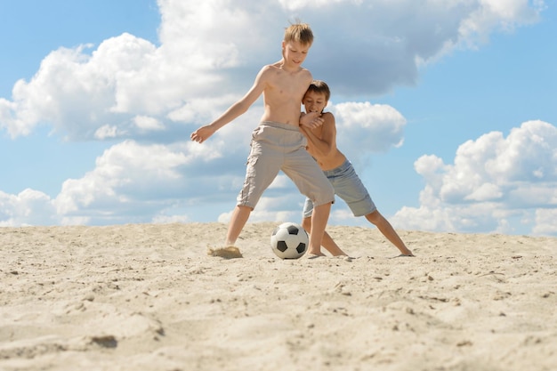 Brothers playing football