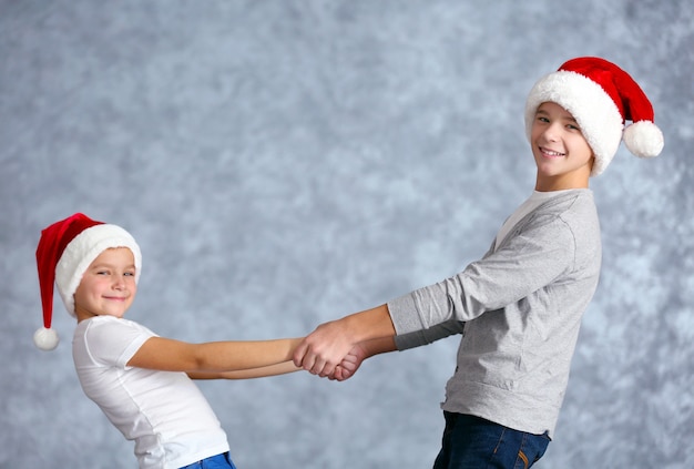 Brothers in Santa hats