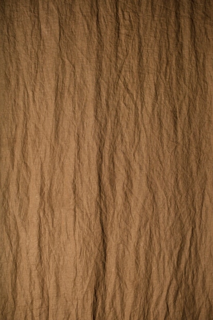 brown background for photo studio texture of crumpled fabric