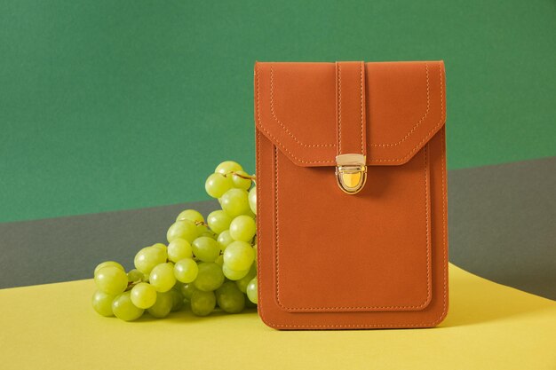 Brown bag made from an alternative material made from grapes waste from the winery for the manufacture of leather