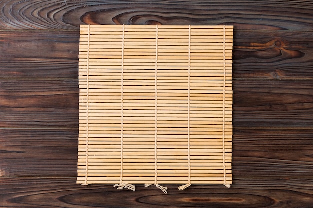 brown Bamboo mat on wooden table