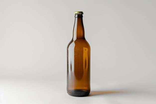 Photo a brown beer bottle sitting on top of a table