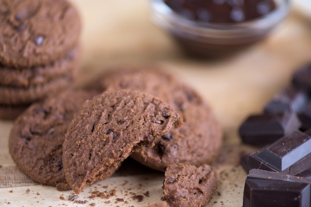 Brown biscuits with dark chocolate composition