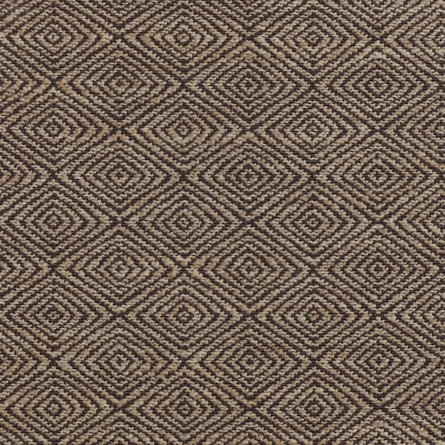 A brown and black geometric pattern with a diamond pattern on the top.