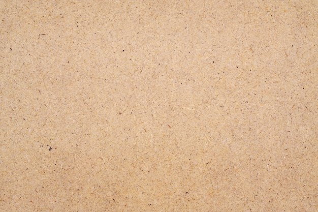 Текстура коричневой доски из переработанной бумаги