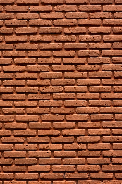 brown brick wall that is old and cracked