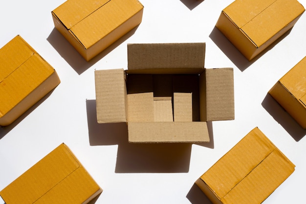 Brown cardboard boxes on white surface