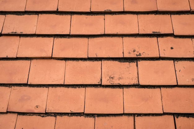 Photo brown ceramic tile roof texture for background