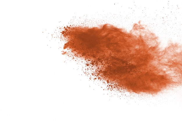 Brown color powder explosion on white background