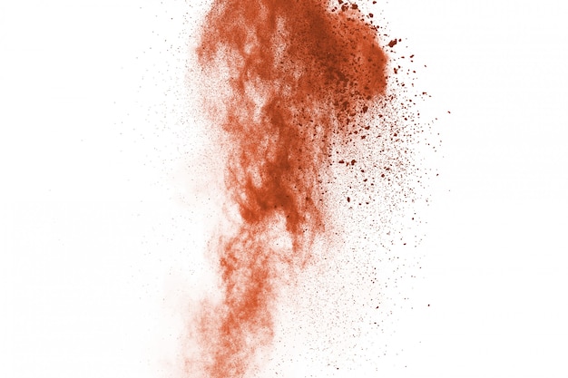 Brown color powder explosion on white background 