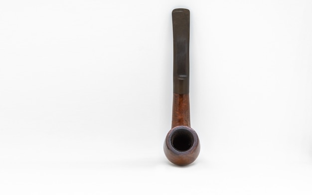 Brown color tobacco smoking pipe on white background