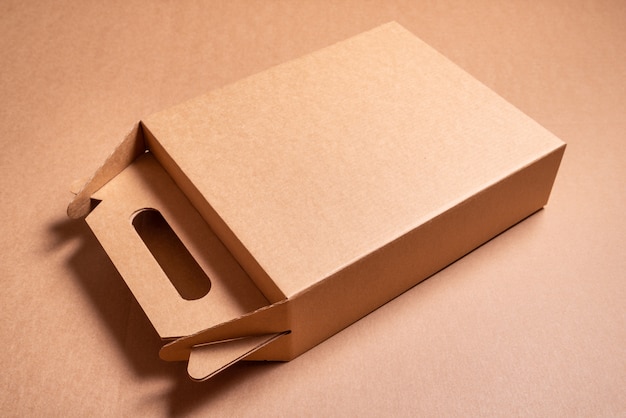 Brown craft cardboard box with handle