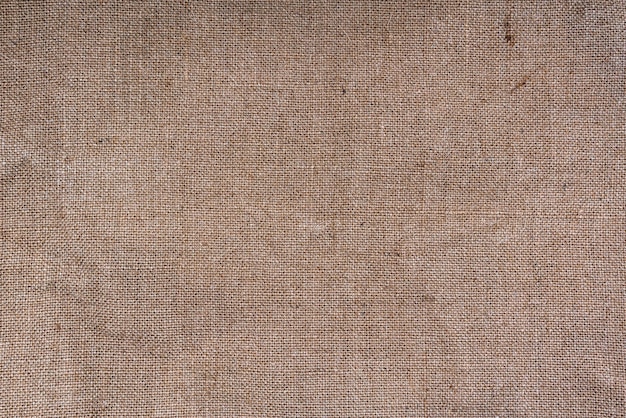 Brown and Cream Canvas or rustic jute sackcloth woven fabric texture background Textiles for coffee beans High quality photo