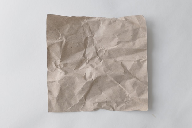 Brown crumpled paper on a white background