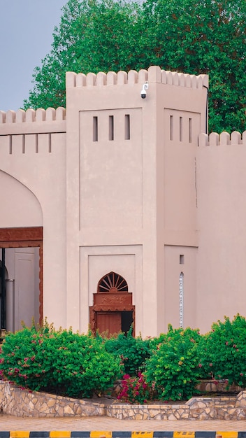 A brown door with a sign that says " hinge " on it.