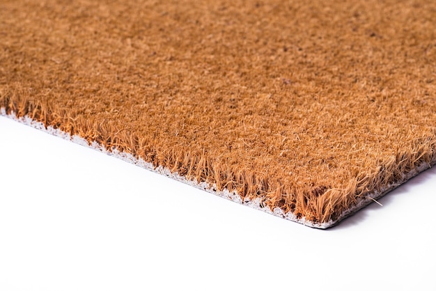 Photo brown doormat carpet, textured, isolated