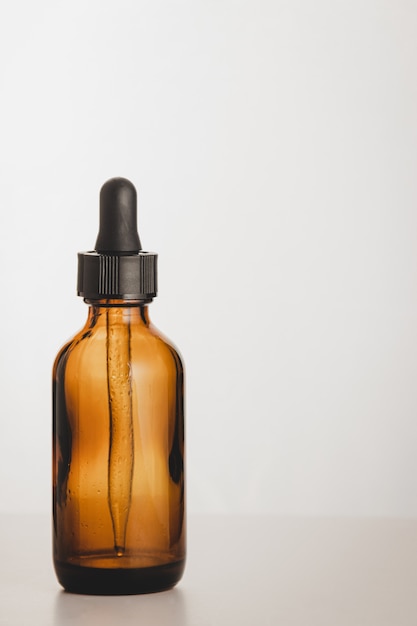 Brown dropper bottle with serum