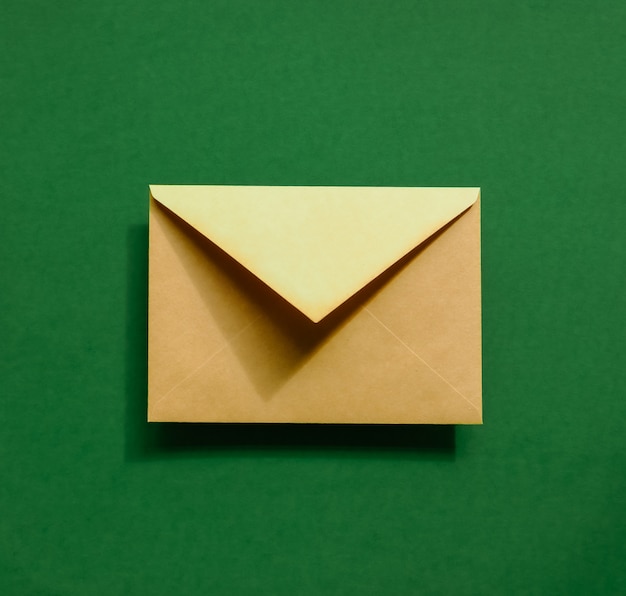 brown envelope on green