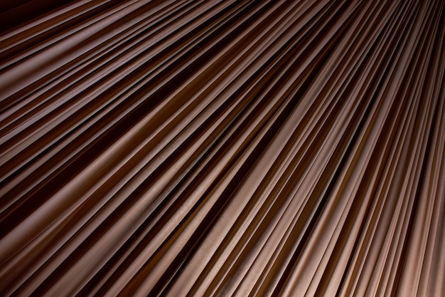 Brown fabric with many pleats as background