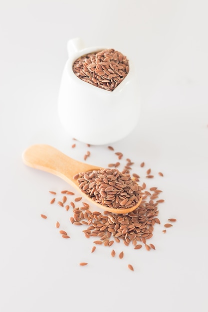 Brown flax seed on clean kitchen table 