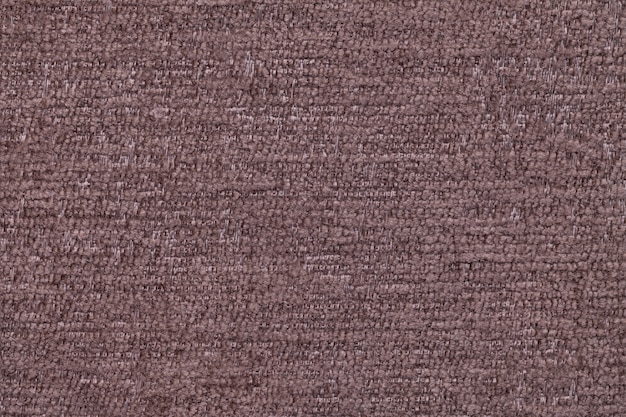 Brown fluffy background of soft and fleecy cloth