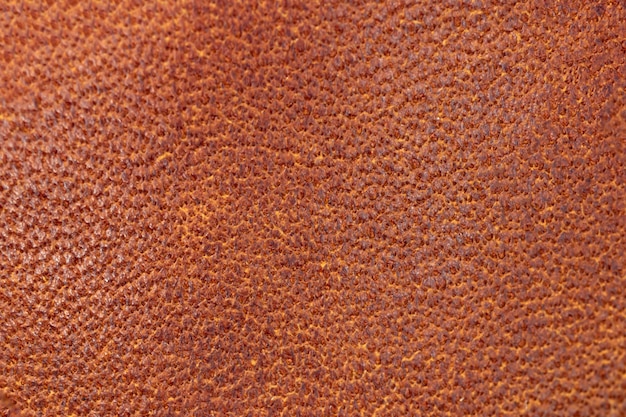 Brown genuine leather texture background high resolution close-up photo