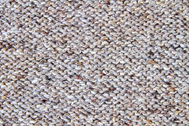 Brown or gray knitted textured background