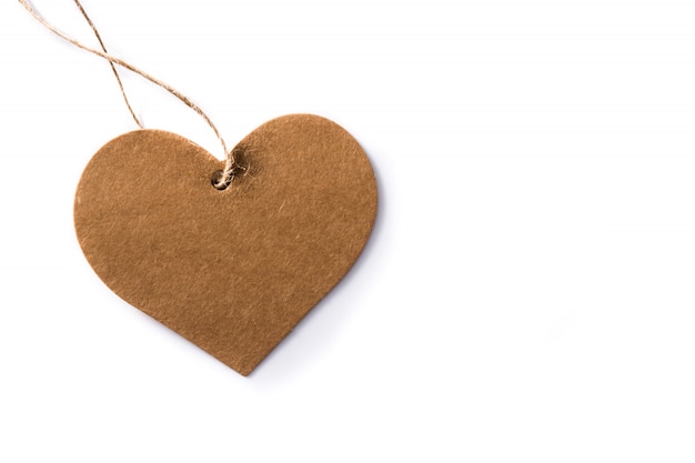 Brown heart shaped label isolated Top view copy space