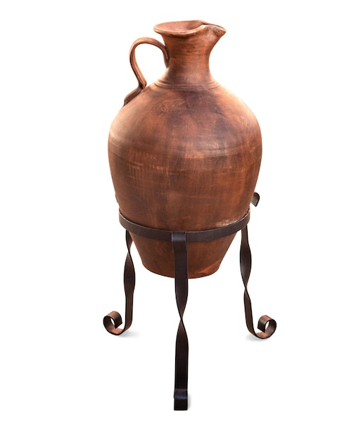 Brown jug on stand on white background with clipping path