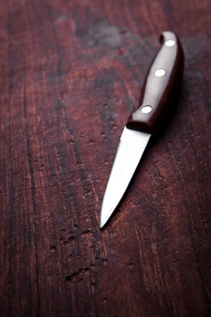 Brown knife on an old kitchen. Cooking, cutting, cooking.