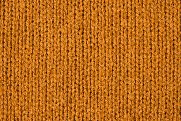 Photo brown knitted wool texture background