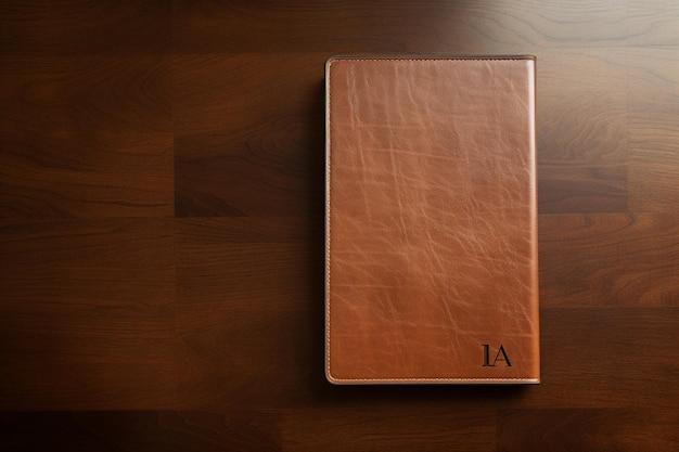 Photo a brown leather cover with a letter that says a on it