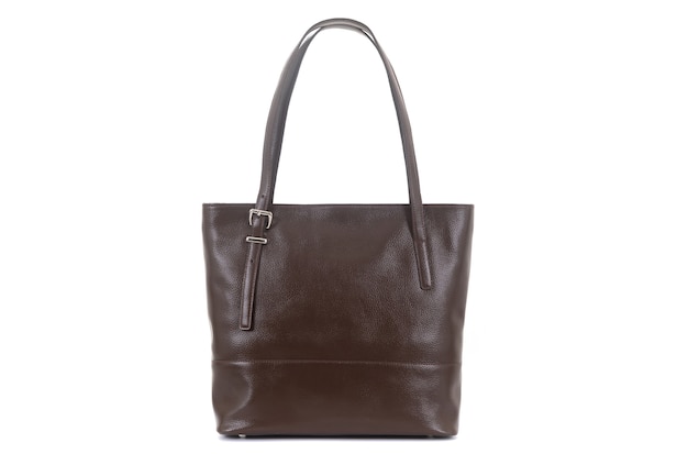 Brown leather female bag on a handle on a white background.