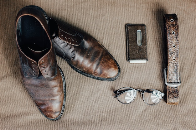 Photo brown leather retro shoes belt steampunk sunglasses and a pocket watch vintage style