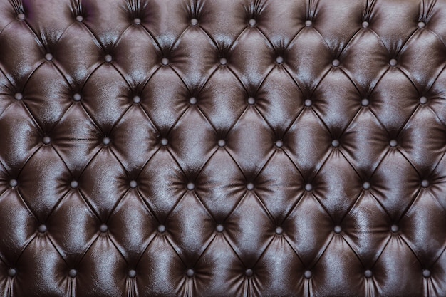 Brown leather texture - background, Brown leather texture of sofa closeup shot.