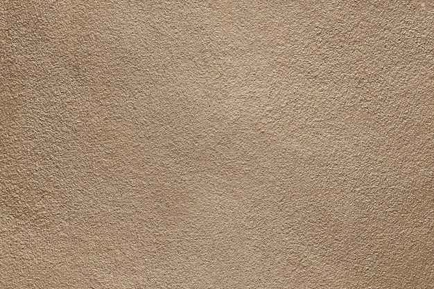 A brown leather texture with a rough edge.