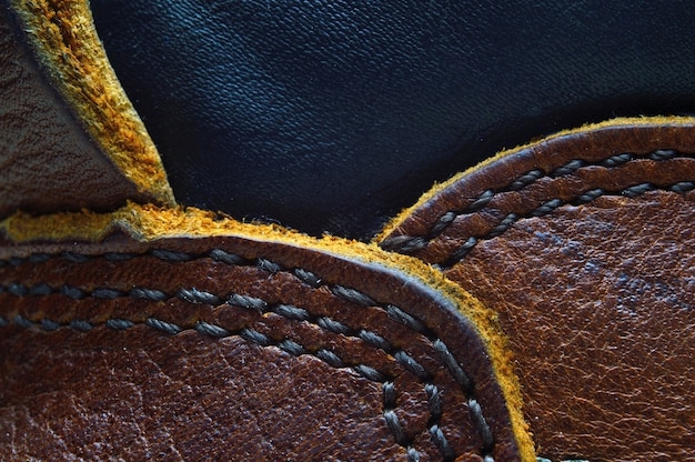 Brown leather texture with a seam