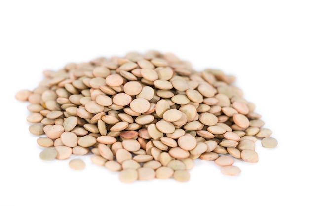 Brown Lentils isolated on white