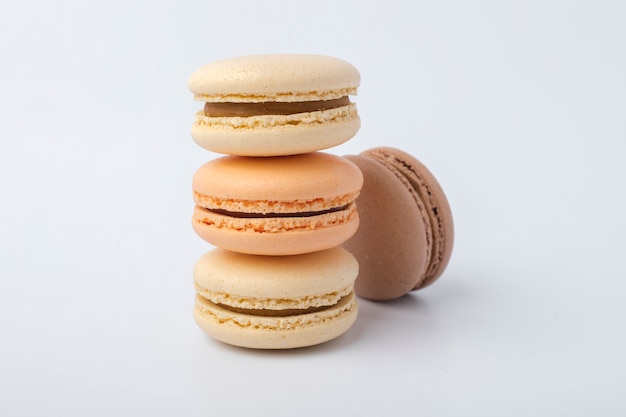 Brown macaron on a light surface